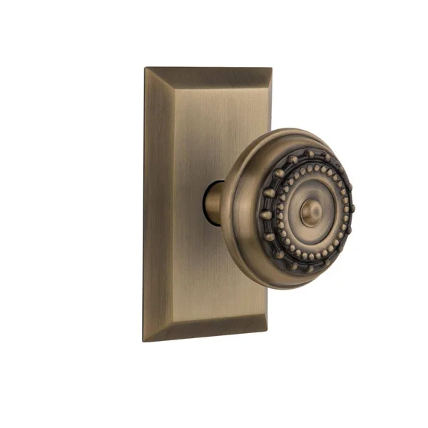 Nostalgic Warehouse 709788 Meadows Passage Door Knob with Studio Plate Antique Brass