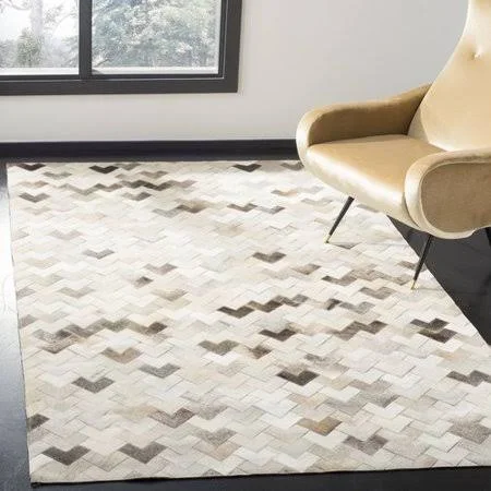 Union Rustic Stasia Hand-Woven Natural Cowhide Area Rug Rug Size: Rectangle 5& x 8&