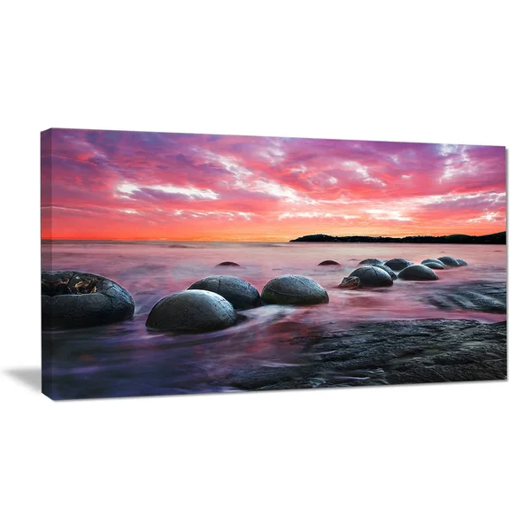Design Art PT9480-32-16 Moeraki Boulders at Sunset Seashore Photo Canvas Art Print - Red, 32x16x22