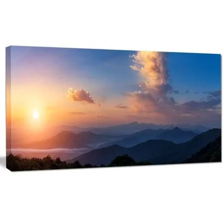 Design Art 'Dark Cloudy Sky Above Mountains' Photographic Print on Wrapped Canvas - Size: 20 inch H x 40 inch W x 1 inch D, Blue